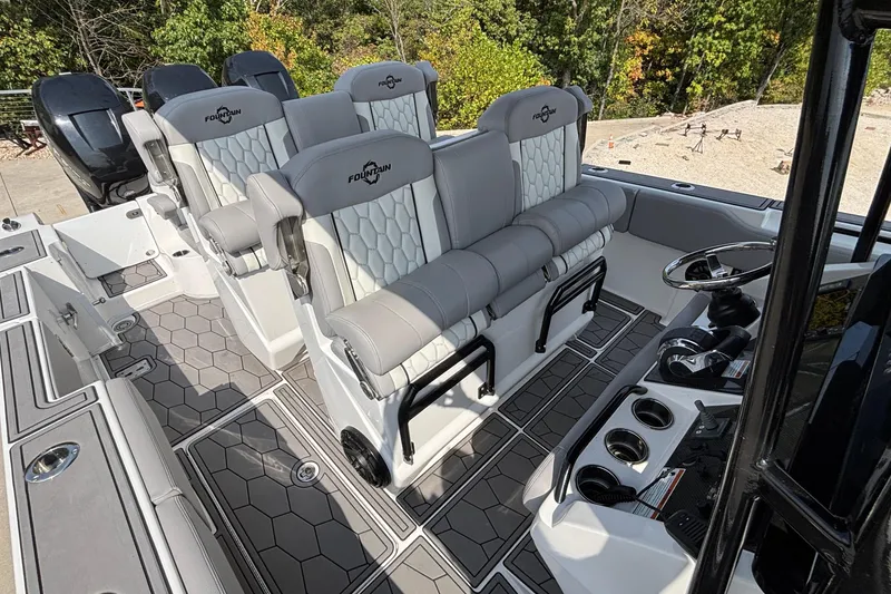 Slide: The Image of 2022 Fountain 38 SC boat interior with luxurious seating and modern design. - 26
