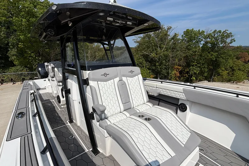Slide: The Image of 2022 Fountain 38 SC boat with sleek seating and modern design. - 27