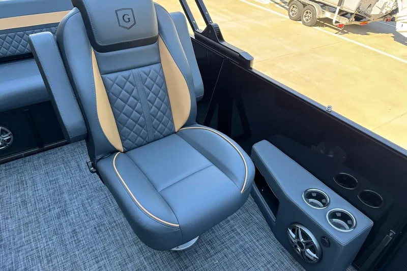 Slide: The Image of Luxurious seating in 2026 Godfrey SWEETWATER 2286 SFL boat with cup holders and speaker. - 18