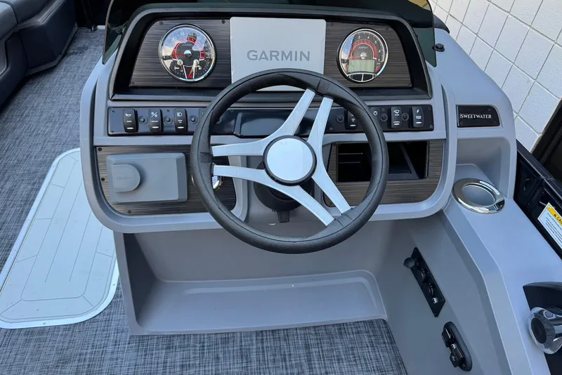 Slide: The Image of Steering console of 2026 Godfrey SWEETWATER 2286 SFL with Garmin display and controls. - 20