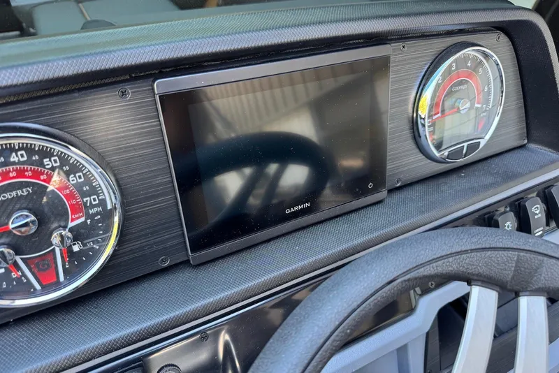 Slide: The Image of Dashboard of 2026 Godfrey SWEETWATER 2286 SFL with Garmin display and gauges. - 21