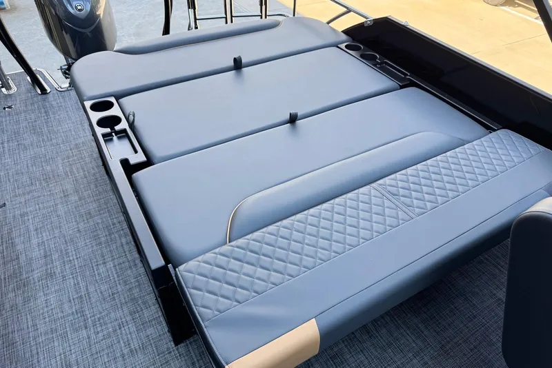 Slide: The Image of 2026 Godfrey SWEETWATER 2286 SFL boat seating with cup holders and quilted upholstery. - 29