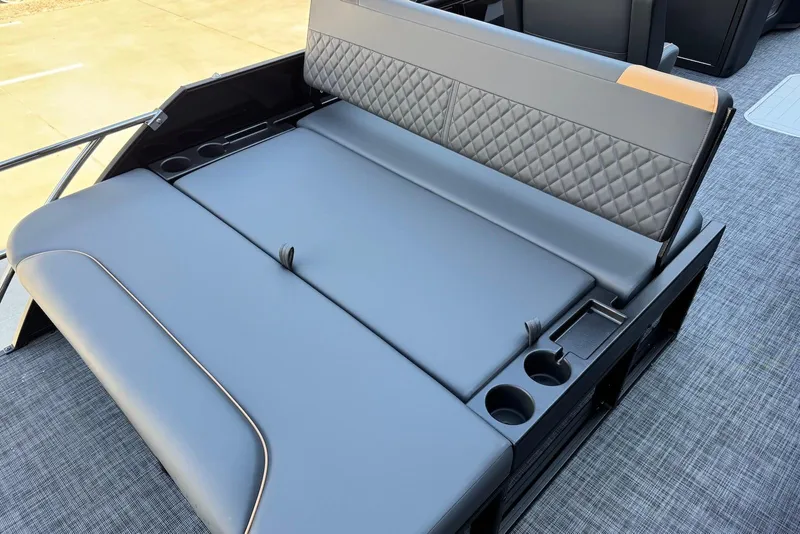 Slide: The Image of 2026 Godfrey SWEETWATER 2286 SFL boat seating with quilted backrest and cup holders. - 32
