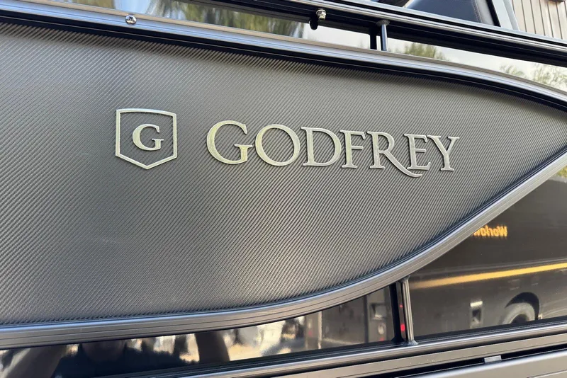 Slide: The Image of Godfrey SWEETWATER 2286 SFL 2026 model logo on textured surface. - 39