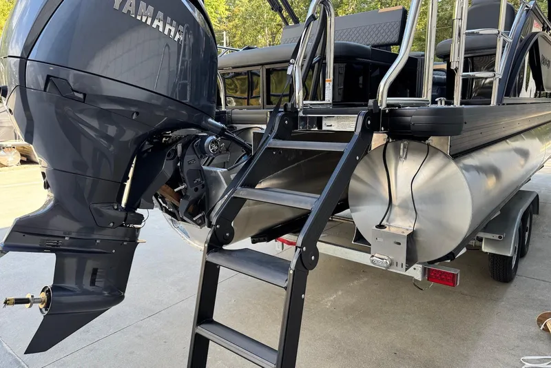 Slide: The Image of 2026 Godfrey SWEETWATER 2286 SFL pontoon boat with Yamaha outboard motor and ladder. - 6