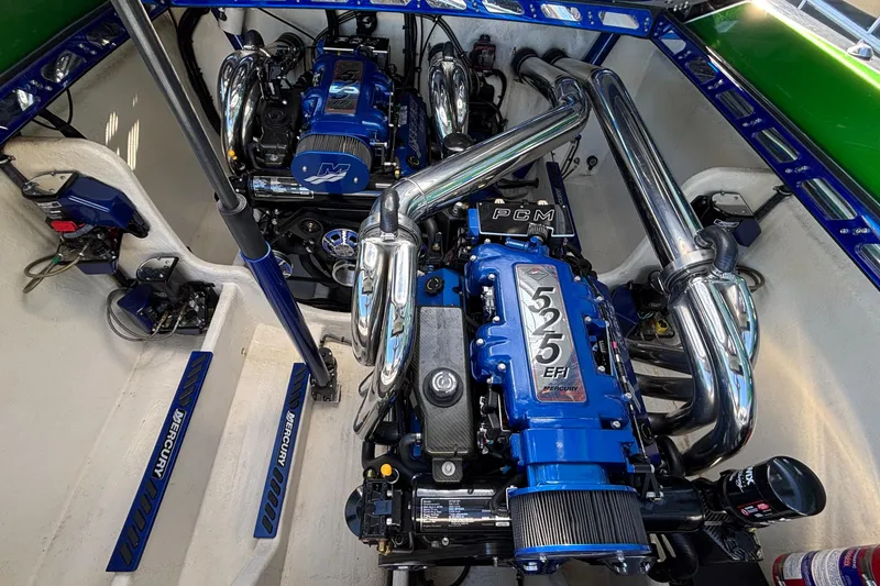 Slide: The Image of 2013 Sunsation 36 XRT boat engine compartment with Mercury 525 EFI engines. - 13