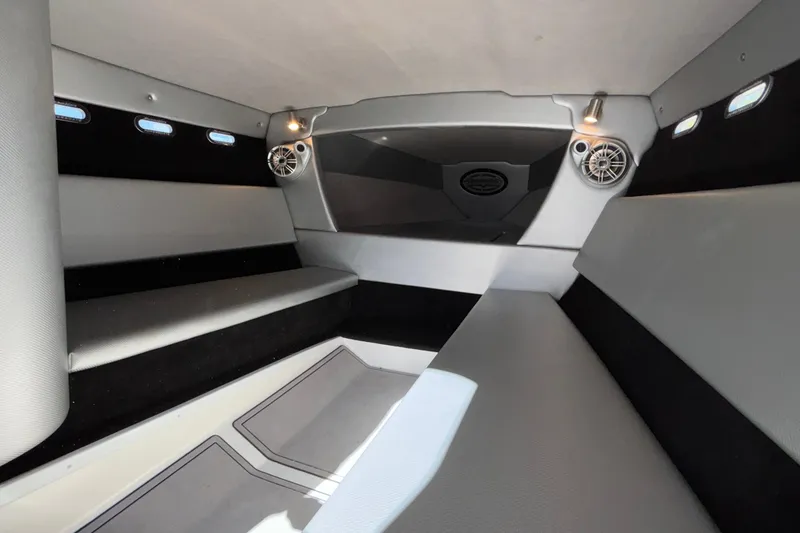Slide: The Image of Interior cabin of 2013 Sunsation 36 XRT boat with seating and speakers. - 16