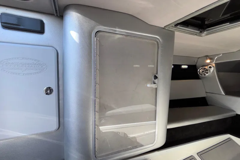 Slide: The Image of Interior of 2013 Sunsation 36 XRT boat, featuring sleek design and modern amenities. - 17