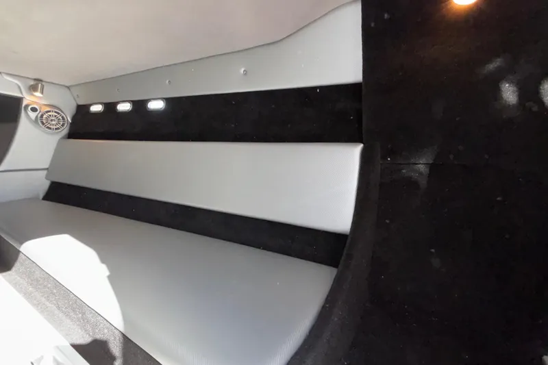 Slide: The Image of Interior of 2013 Sunsation 36 XRT boat, featuring sleek seating and modern design elements. - 18