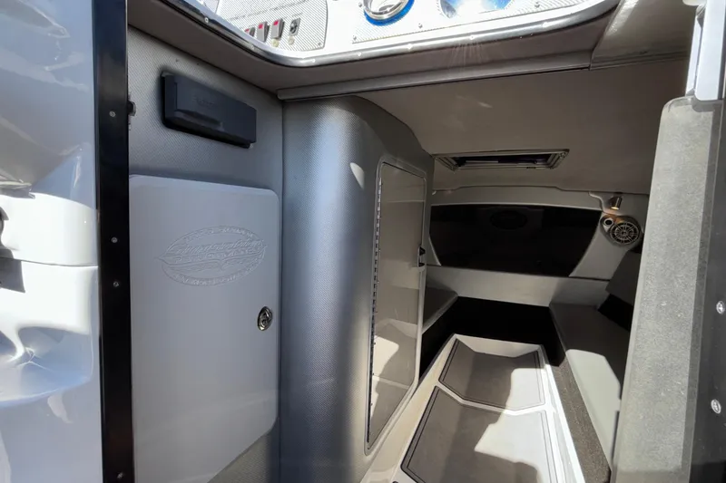 Slide: The Image of Interior cabin of 2013 Sunsation 36 XRT boat, featuring sleek design and modern amenities. - 21