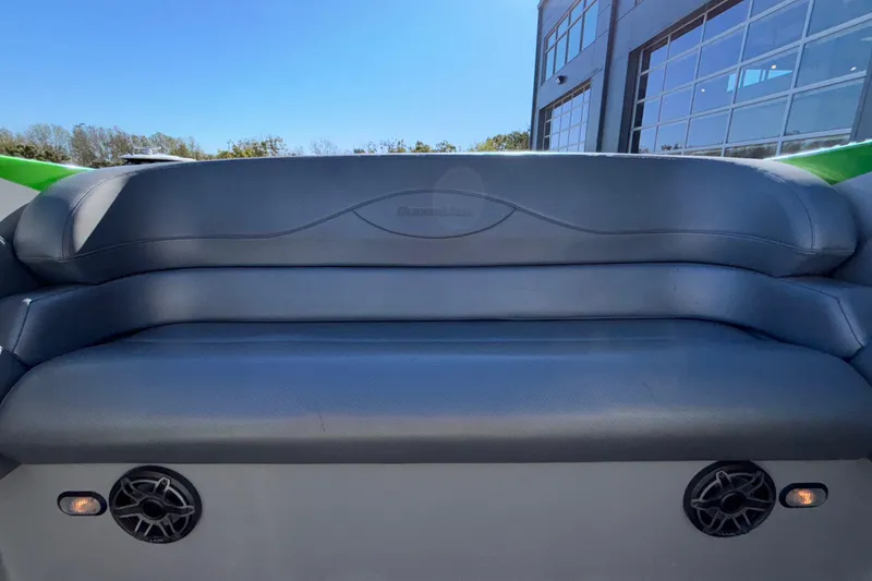 Slide: The Image of 2013 Sunsation 36 XRT boat interior with gray seating and speakers. - 24