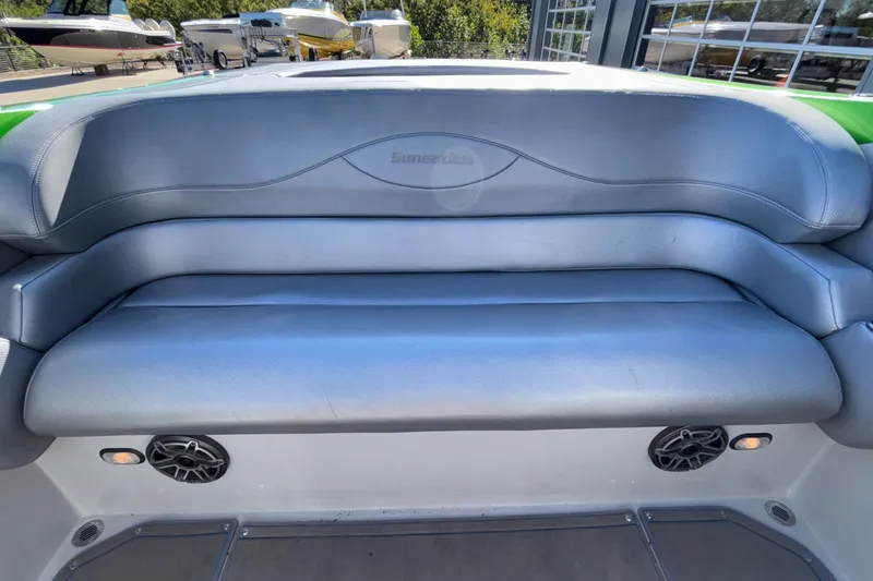 Slide: The Image of 2013 Sunsation 36 XRT boat interior with gray seating and speakers. - 25