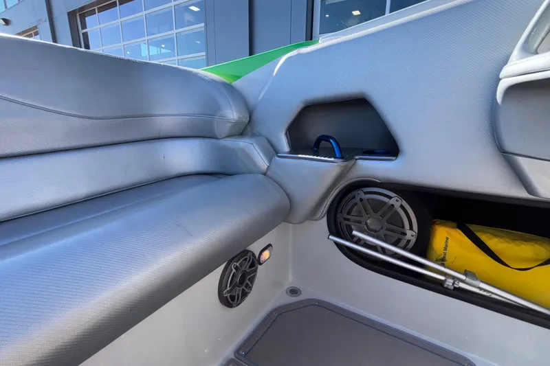 Slide: The Image of Interior of 2013 Sunsation 36 XRT boat with gray seating and speaker system. - 27