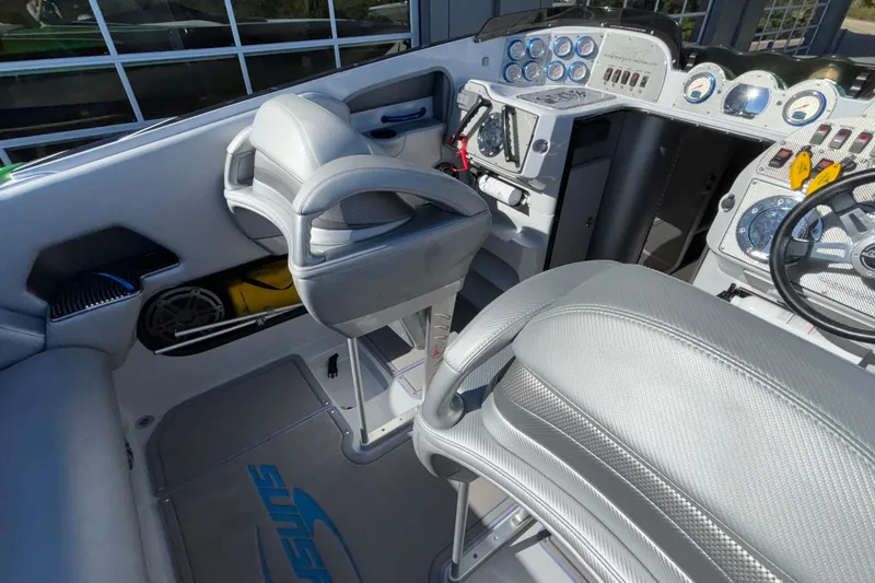 Slide: The Image of Interior of 2013 Sunsation 36 XRT boat with modern dashboard and seating. - 28