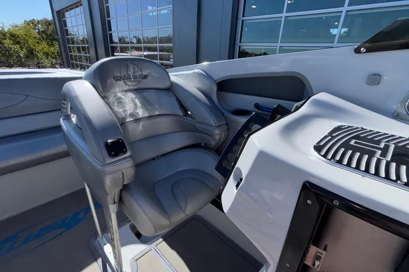 Slide: The Image of 2013 Sunsation 36 XRT boat interior with gray seating and control panel. - 35