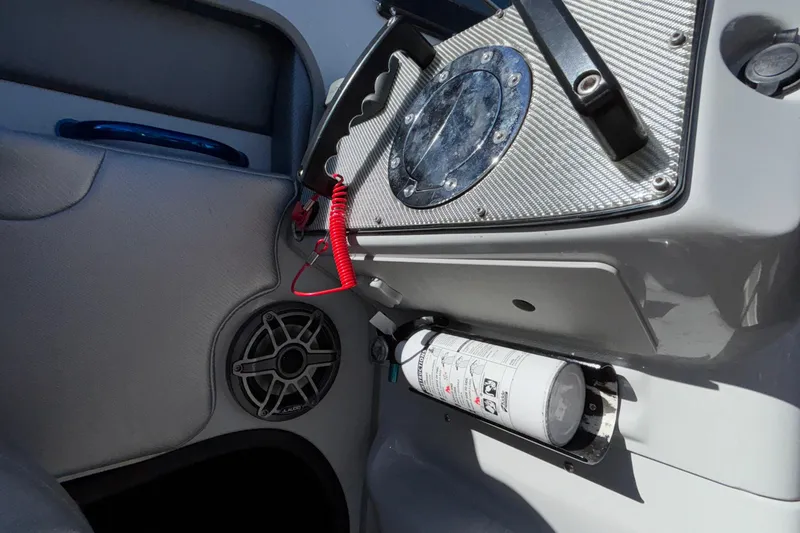 Slide: The Image of 2013 Sunsation 36 XRT interior with speaker, fire extinguisher, and control panel. - 39