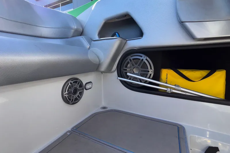 Slide: The Image of Interior of 2013 Sunsation 36 XRT boat with speakers and storage compartment. - 43