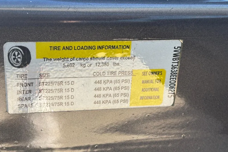 Slide: The Image of Tire and loading information label on 2013 Sunsation 36 XRT, showing pressure and weight limits. - 47