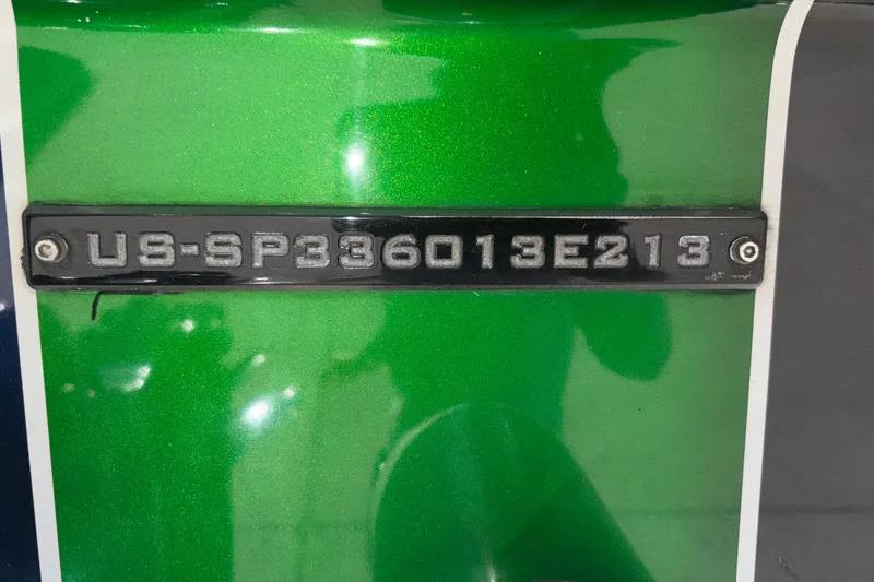 Slide: The Image of 2013 Sunsation 36 XRT boat identification number on green surface. - 7