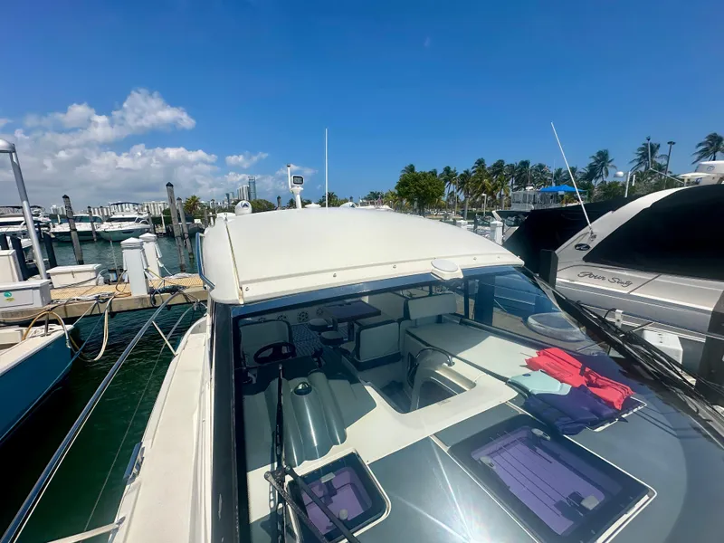 Slide: The Image of 2016 Bavaria Sport 360 HT yacht docked at a marina on a sunny day. - 13