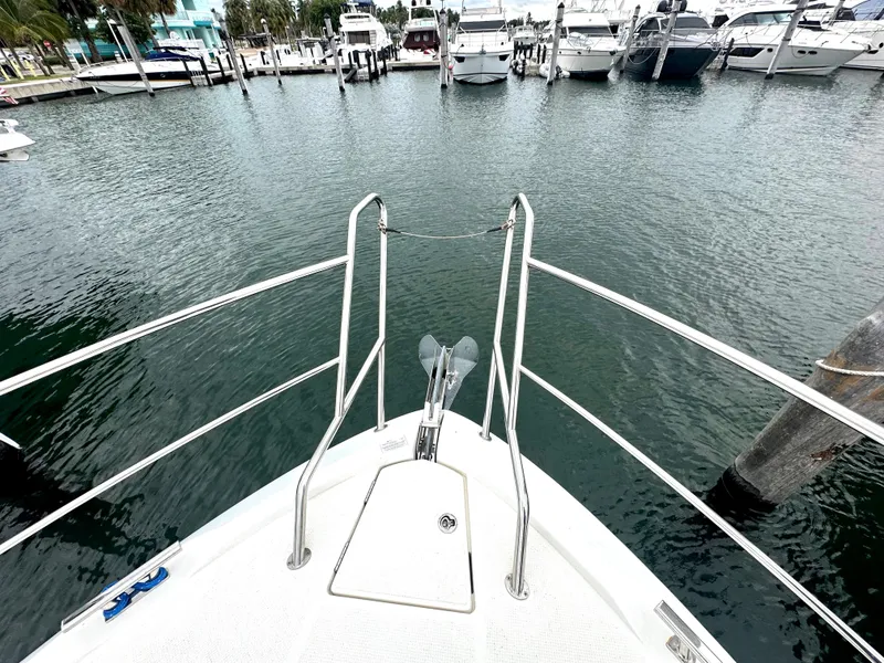 Slide: The Image of Bow view of 2016 Bavaria Sport 360 HT yacht docked at marina. - 14