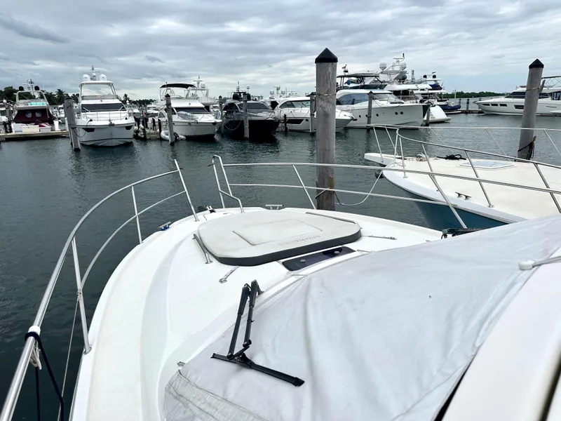 Slide: The Image of 2016 Bavaria Sport 360 HT docked at a marina with other boats. - 20