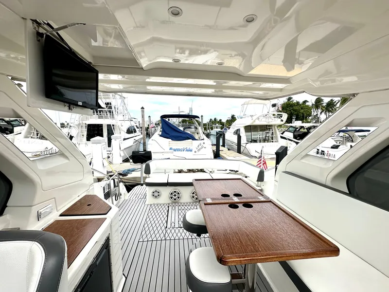 Slide: The Image of Interior view of 2016 Bavaria Sport 360 HT yacht with docked boats in background. - 27