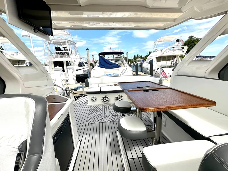 Slide: The Image of Interior of 2016 Bavaria Sport 360 HT yacht with docked boats in background. - 39