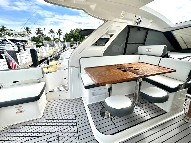 Slide: The Image of 2016 Bavaria Sport 360 HT yacht with outdoor seating and dining area. - 48