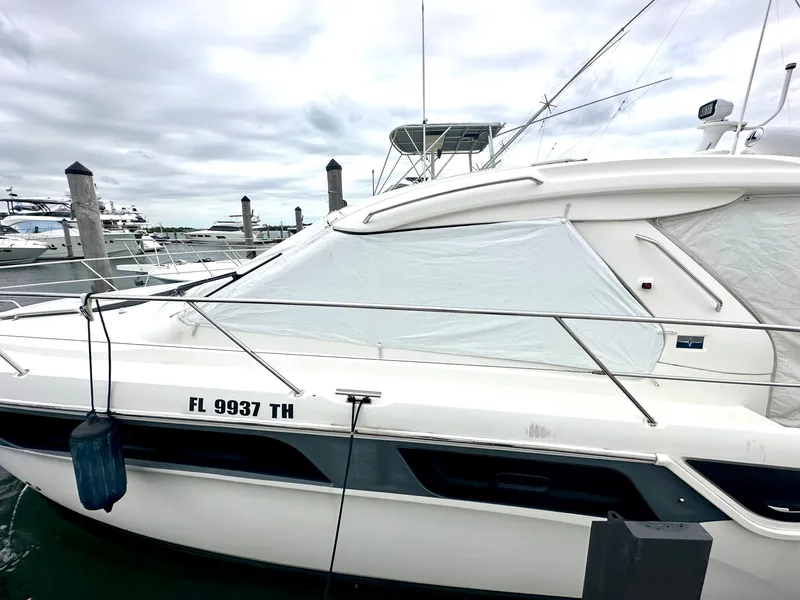 Slide: The Image of 2016 Bavaria Sport 360 HT yacht docked at marina, side view. - 6