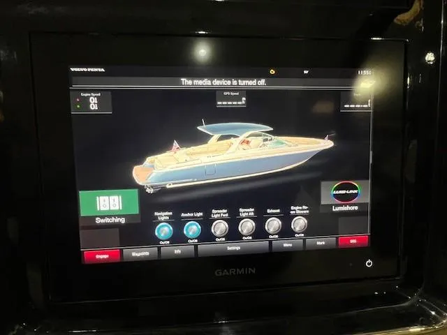 Slide: The Image of Garmin display showing 2021 Chris-Craft Launch 35 GT boat controls and settings. - 23