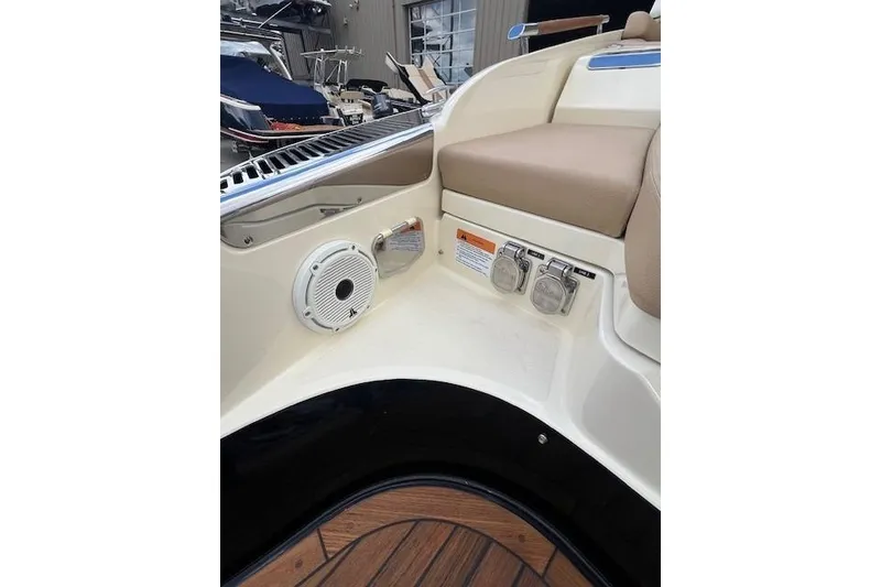 Slide: The Image of 2021 Chris-Craft Launch 35 GT interior with speaker and seating detail. - 25