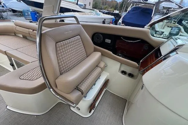 Slide: The Image of 2021 Chris-Craft Launch 35 GT interior with luxurious seating and elegant dashboard design. - 30