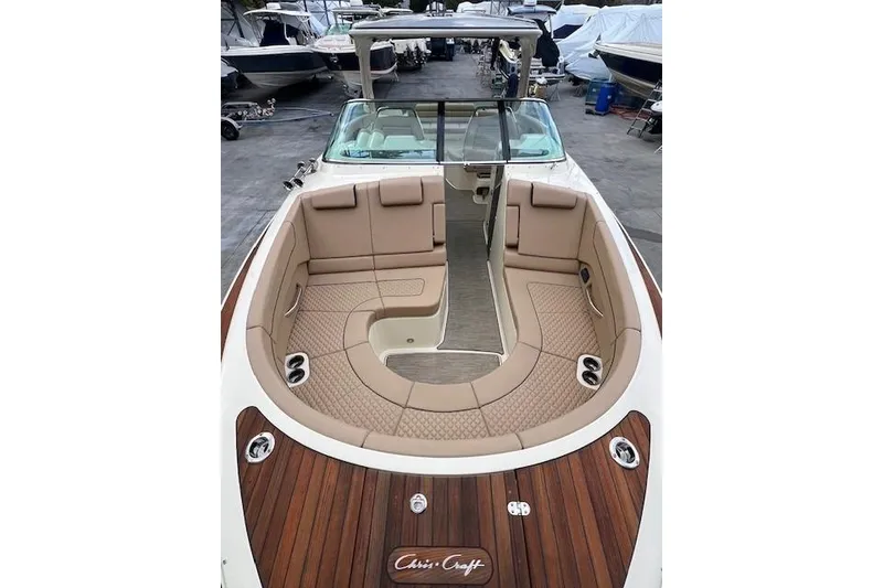 Slide: The Image of 2021 Chris-Craft Launch 35 GT boat with luxurious seating and elegant wood finish. - 38