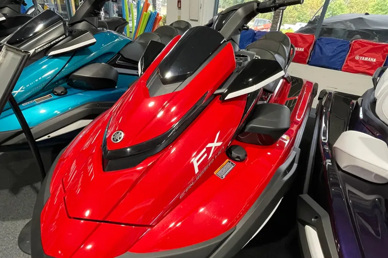The Image of 2026 Yamaha WaveRunner FX Cruiser HO in vibrant red on display. - 0