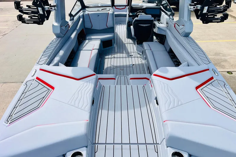 Slide: The Image of 2026 Nautique Super Air Nautique G25 interior with sleek seating and modern design. - 13
