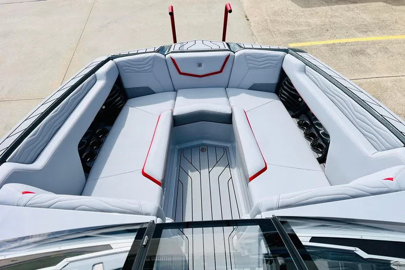 Slide: The Image of 2026 Nautique Super Air Nautique G25 boat interior with sleek seating and modern design. - 15