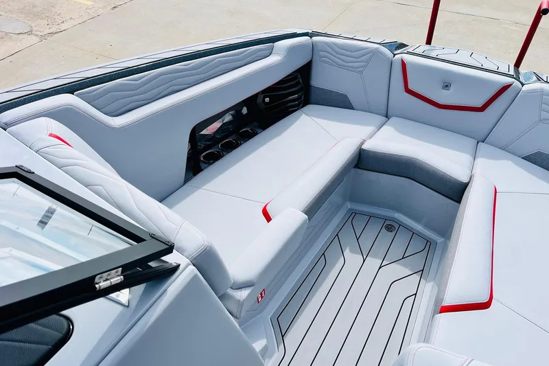 Slide: The Image of 2026 Nautique Super Air Nautique G25 interior with sleek seating and modern design. - 17