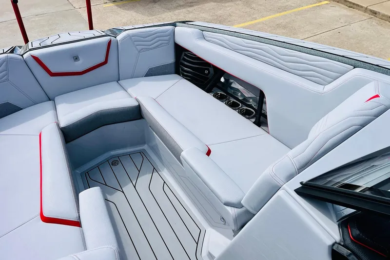 Slide: The Image of 2026 Nautique Super Air Nautique G25 interior with sleek seating and modern design. - 19