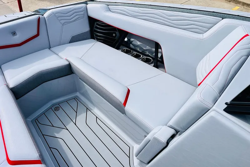 Slide: The Image of 2026 Nautique Super Air Nautique G25 interior with sleek seating and modern design. - 23