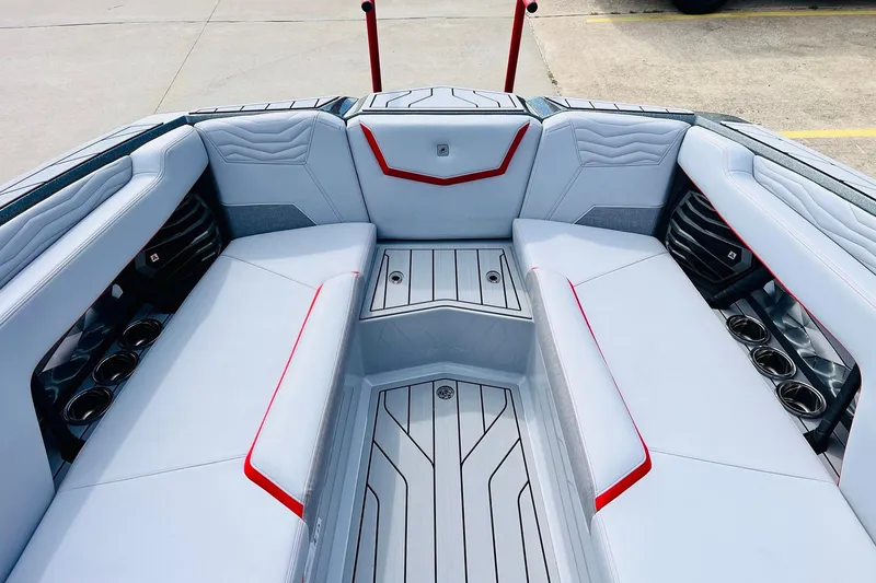Slide: The Image of 2026 Nautique Super Air Nautique G25 interior with sleek seating and modern design. - 25