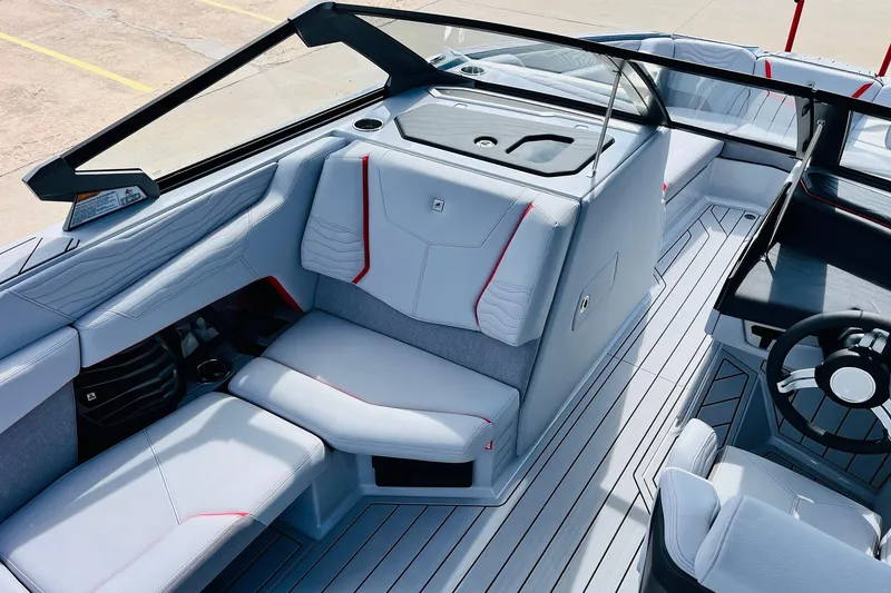 Slide: The Image of 2026 Nautique Super Air Nautique G25 interior with sleek seating and modern design. - 28