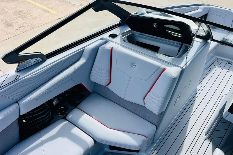 Slide: The Image of 2026 Nautique Super Air Nautique G25 interior with sleek seating and modern design. - 29