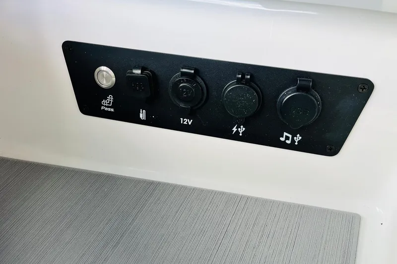 Slide: The Image of Control panel of 2026 Nautique Super Air Nautique G25 with USB and 12V ports. - 31