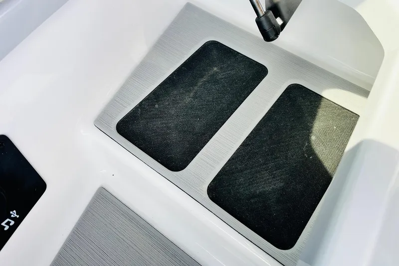 Slide: The Image of 2026 Nautique Super Air Nautique G25 boat interior with non-slip flooring detail. - 32
