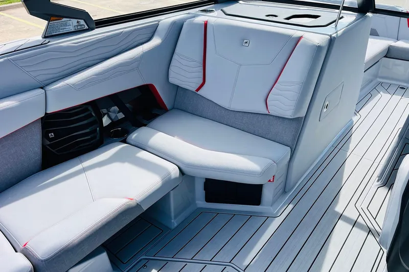 Slide: The Image of 2026 Nautique Super Air Nautique G25 interior with sleek seating and modern design. - 33