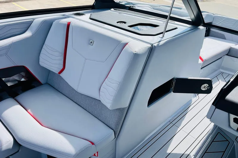 Slide: The Image of 2026 Nautique Super Air Nautique G25 interior with sleek seating and modern design. - 34