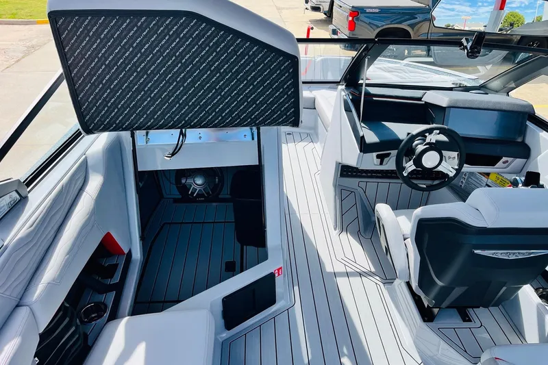 Slide: The Image of 2026 Nautique Super Air Nautique G25 interior with sleek design and modern dashboard. - 35