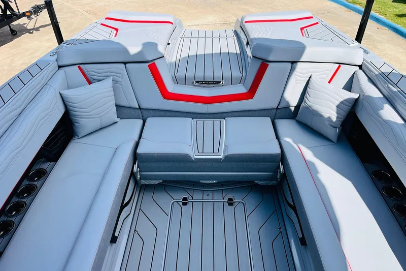 Slide: The Image of Luxurious interior of 2026 Nautique Super Air Nautique G25 boat with sleek seating. - 44