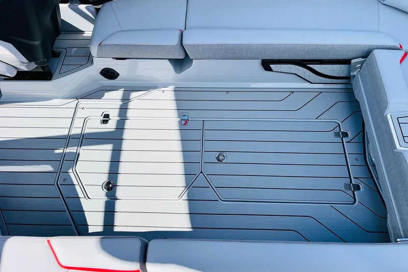 Slide: The Image of 2026 Nautique Super Air Nautique G25 interior with sleek seating and modern design. - 63